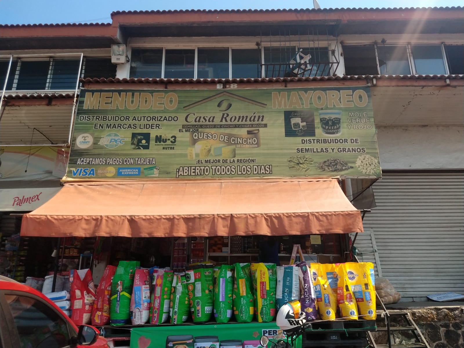 Toldo fijo para negocio — 13