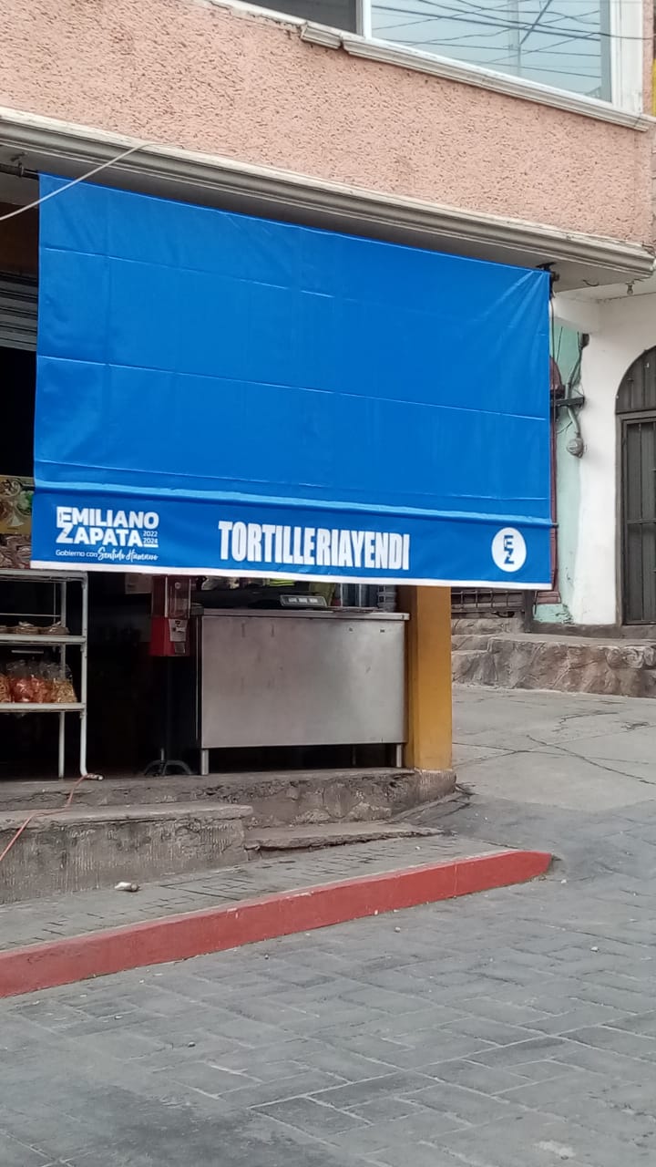 Toldo fijo para negocio — 15