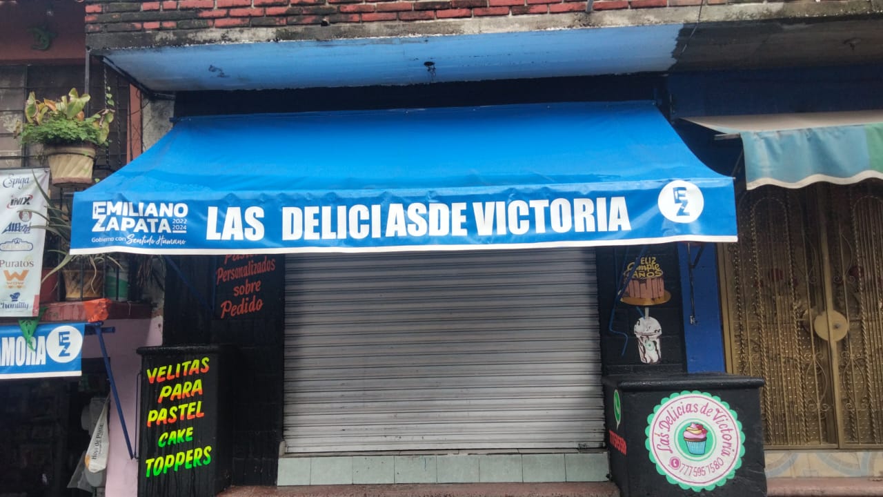 Toldo fijo para negocio — 16