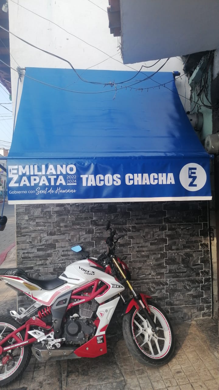 Toldo fijo para negocio — 18